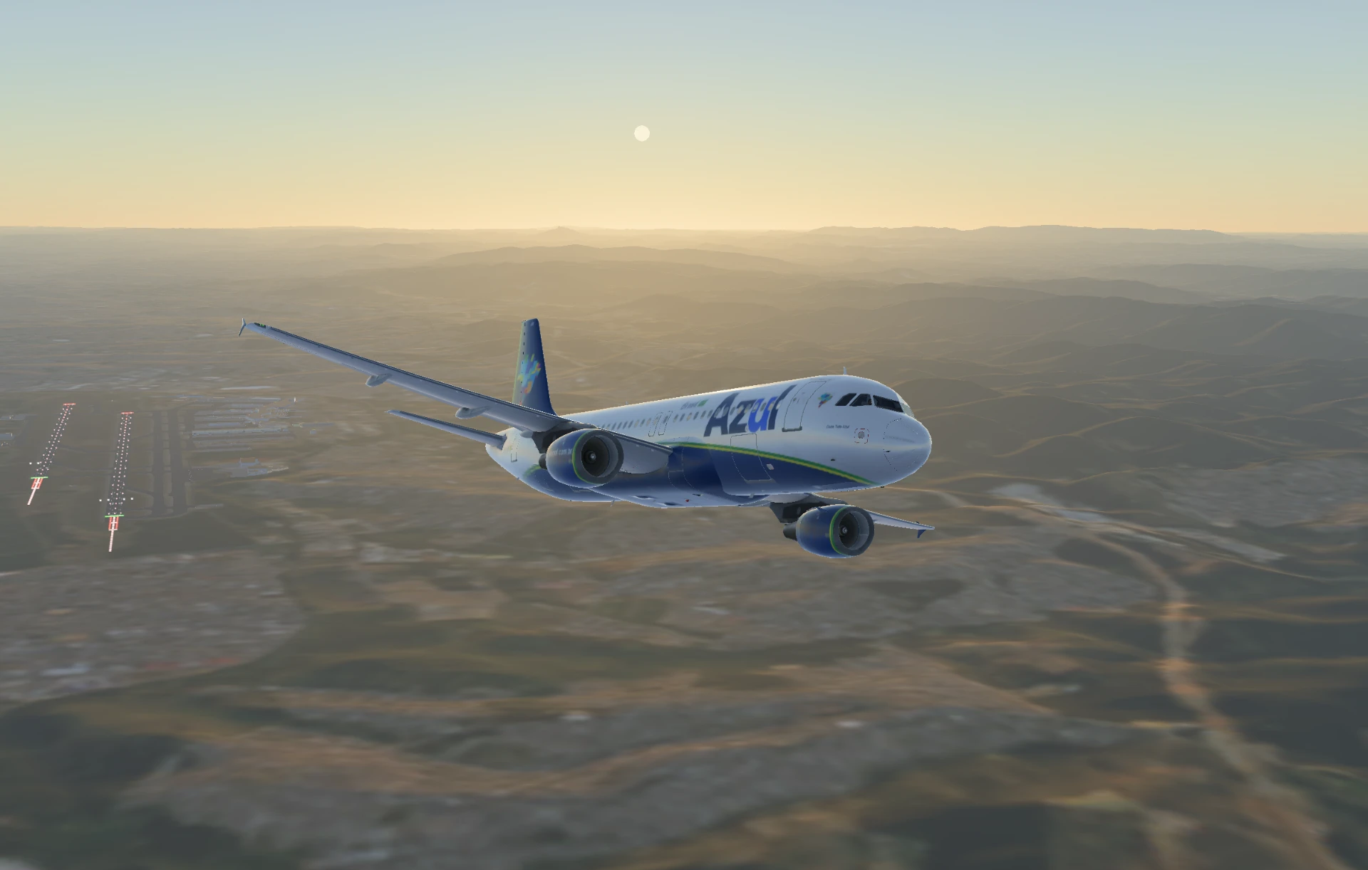 Azul aircraft cruising above the mountains at sunset